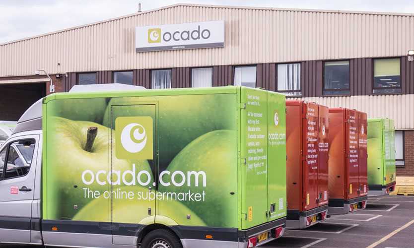 Ocado warehouse and delivery trucks in Wimbledon, southwest London