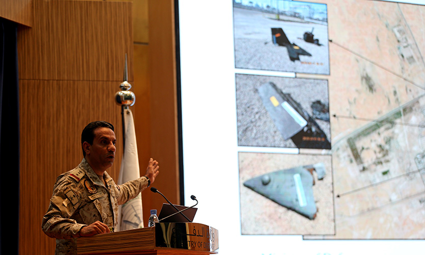 Saudi defense ministry spokesman Colonel Turki Al-Malik displays on a screen drones that the Saudi government says attacked an Aramco oil facility, during a news conference in Riyadh, Saudi Arabia, on Sept. 18, 2019.