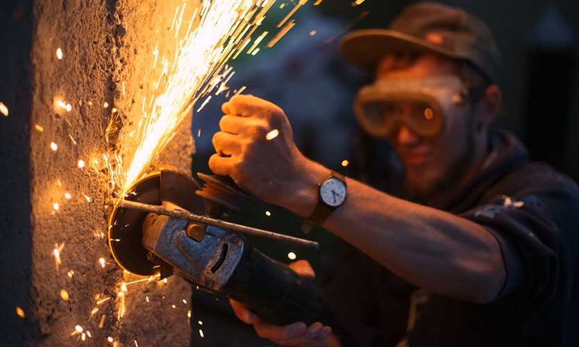 Using eye protection with grinder